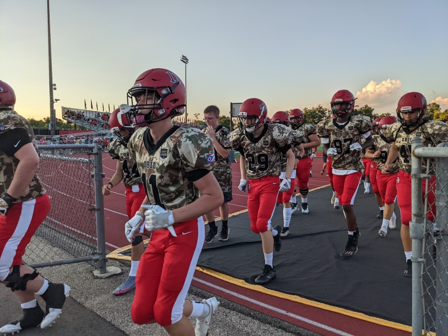 football players leaving stadium